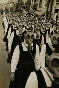 School girls in horrifying gas masks. WWII